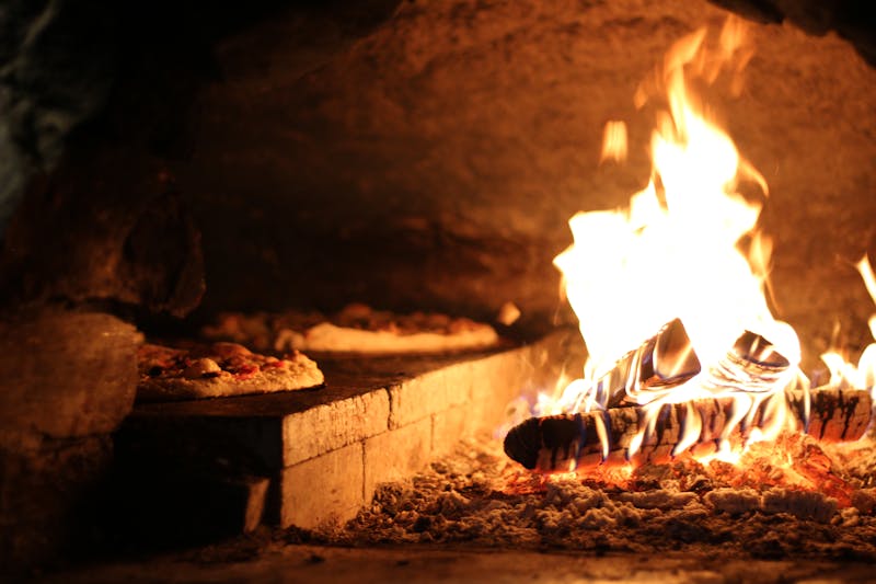 Dewey's pizza restaurant bar and lounge area with warm atmosphere